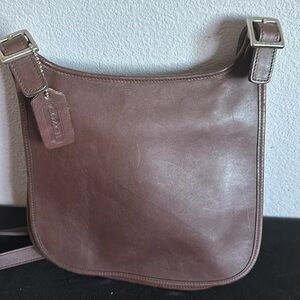 Brown Coach leather handbag with shoulder straps